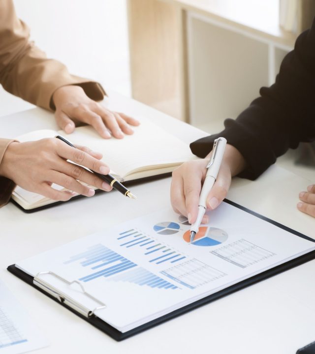 business financier audit working with calculator and data annual report